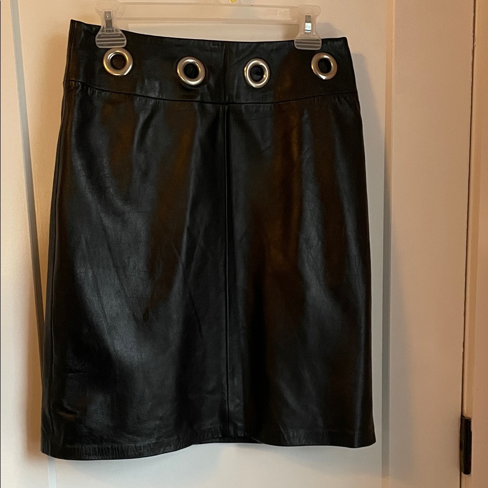 Chic Black Leather Skirt with Grommet Detail and Chain Belt